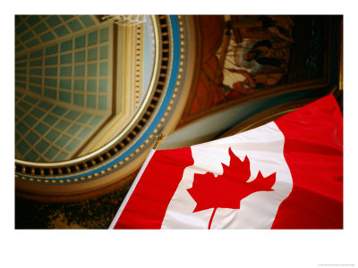 Interior Of Parliament House With Canadian Flag In Foreground, Victoria, Canada by Lawrence Worcester Pricing Limited Edition Print image