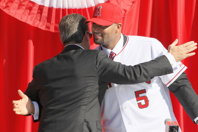 Los Angeles Angels Of Anaheim, Ca - December 10: Newly Signed Albert Pujols And Arturo Moreno by Stephen Dunn Pricing Limited Edition Print image