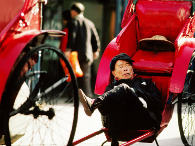 Rickshaw Puller At Star Ferry Pier, Hong Kong, China by Alain Evrard Pricing Limited Edition Print image