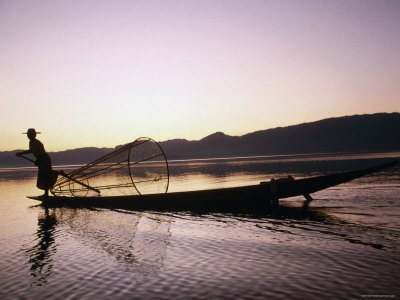 Fisherman On Inle Lake At Sunset, Myanmar by Alain Evrard Pricing Limited Edition Print image