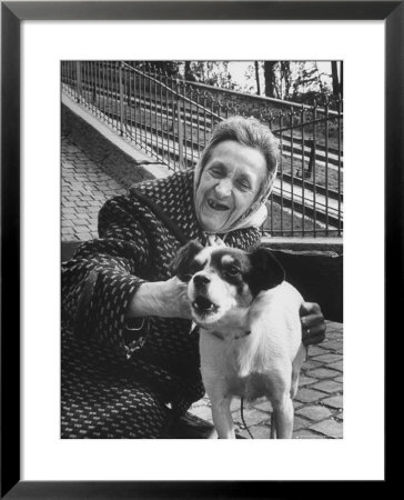 Elderly Woman With Pet Dog Miquette On Steps Of Montmartre by Alfred Eisenstaedt Pricing Limited Edition Print image