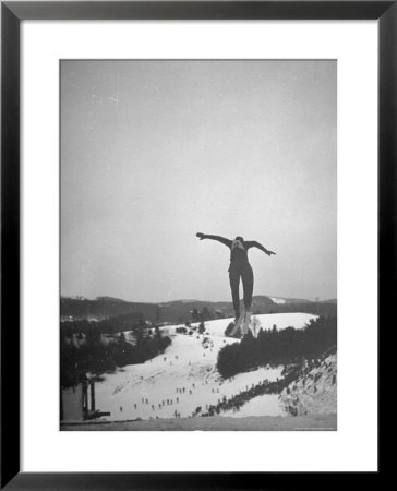 Skier Sailing Through The Air During Dartmouth College Winter Carnival by Peter Stackpole Pricing Limited Edition Print image