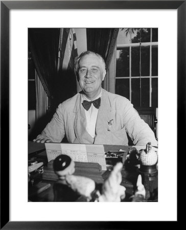 Portrait Of President Franklin Roosevelt Alone, Smiling, At Desk In White House by George Skadding Pricing Limited Edition Print image