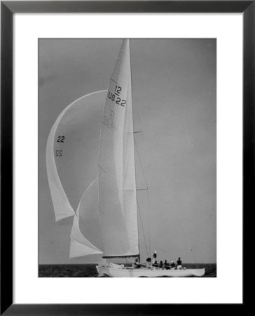 Nine Individuals Are Seen Sailing On Three Sail Intrepid Sailboat During The America's Cup Trials by George Silk Pricing Limited Edition Print image