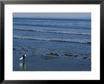 Longboard Surfer Watches The Surf Break On An Isla Vista Beach by Rich Reid Pricing Limited Edition Print image