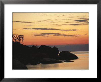Lake Malawi At Sunset by Carsten Peter Pricing Limited Edition Print image