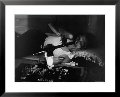 Man In Opium Den by John Dominis Pricing Limited Edition Print image