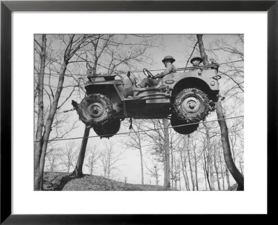 Group Of Us Soldiers Pulling A Jeep Over A Ravine Using Ropes While On Maneuvers by William C. Shrout Pricing Limited Edition Print image