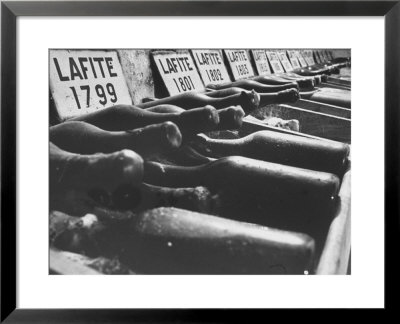 Bottles Of Lafite Wines, Now Museum Pieces In French Wine Cellar by Carlo Bavagnoli Pricing Limited Edition Print image