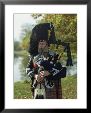 Bagpiper, Scotland, United Kingdom, Europe by Nigel Francis Pricing Limited Edition Print image