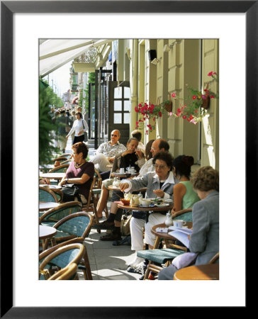 Cafe At Gedimino Pospektas, The Main Street Of The Modern City, Vilnius, Lithuania by Yadid Levy Pricing Limited Edition Print image
