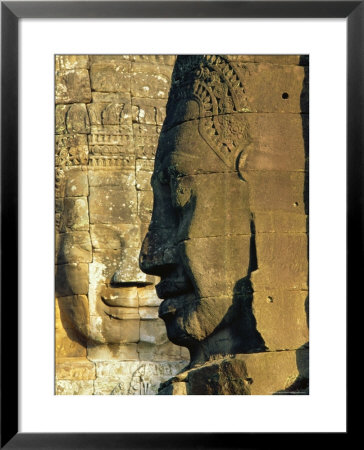 Stone Heads Typifying Cambodia On The Bayon Temple At Angkor Wat, Siem Reap, Cambodia, Asia. by Bruno Morandi Pricing Limited Edition Print image