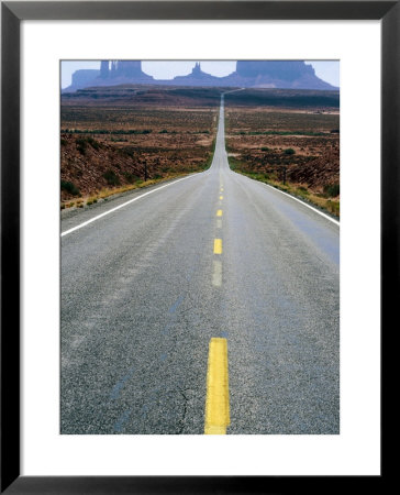 Highway 163 And Distant Buttes, Monument Valley Navajo Tribal Park, U.S.A. by Ruth Eastham Pricing Limited Edition Print image