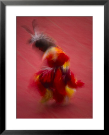 Native American Dancer In Traditional Costume Dancing At A Powwow by Michael Melford Pricing Limited Edition Print image