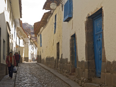 Street Scene Of Buildings And People On Sidewalk, Peru by Dennis Kirkland Pricing Limited Edition Print image