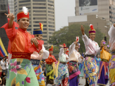 Malay Male Dancer Wearing Traditional Dress At Celebrations Of Kuala Lumpur City Day Commemoration by Richard Nebesky Pricing Limited Edition Print image