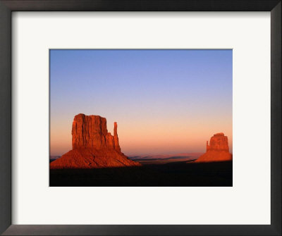 Sunlight Strikes The East And West Mitten Buttes, Monument Valley Navajo Tribal Park, Arizona by Mark Newman Pricing Limited Edition Print image