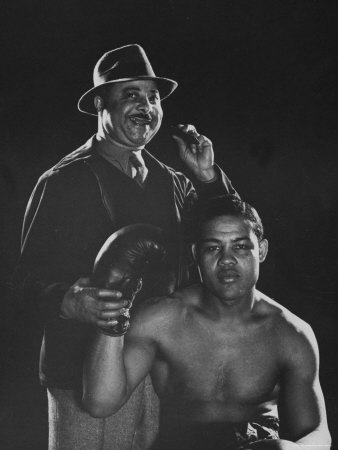Heavyweight Champion Joe Louis With His Manager, John Roxborough by Gjon Mili Pricing Limited Edition Print image