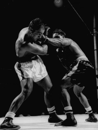 Boxer Archie Moore Fighting Against Rocky Marciano by Grey Villet Pricing Limited Edition Print image