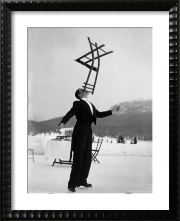 Head Waiter Rene Breguet Balancing Chair On Chin At Ice Rink Of Grand Hotel by Alfred Eisenstaedt Pricing Limited Edition Print image