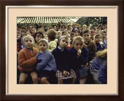 Children Watch Guignol Puppet Show In Open Air Theater At Parc De Montsouris by Alfred Eisenstaedt Pricing Limited Edition Print image