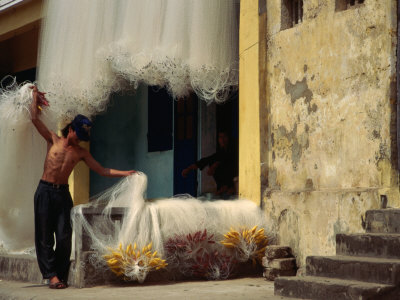 Man Repairing Nets, Hoi An, Vietnam by Jerry Alexander Pricing Limited Edition Print image