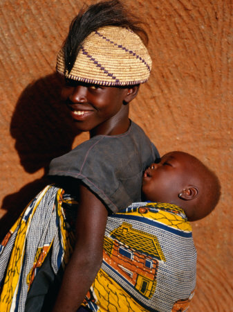 Betamaribe (Somba) Girl With Baby Brother Sleeping On Her Back, Tagaye, Benin by Pershouse Craig Pricing Limited Edition Print image