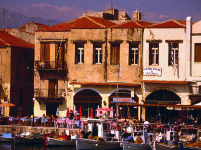 Fishing Boats Moored In Harbour And Buildings, Rethymno, Crete, Greece by Jon Davison Pricing Limited Edition Print image