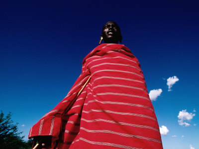 Maasai Man, Masai Mara National Reserve, Kenya by Michael Coyne Pricing Limited Edition Print image