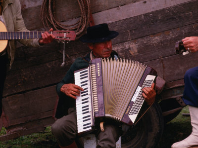 Gaucho Musicians Playing Guitar And Piano Accordian, Buenos Aires, Argentina by Michael Coyne Pricing Limited Edition Print image