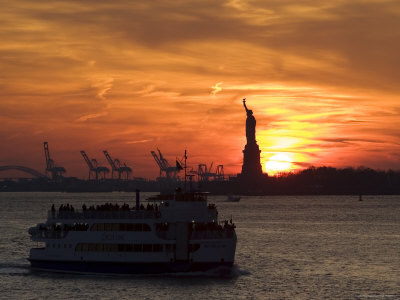 Statue Of Liberty And Staten Island Ferry At Sunset by Gavin Gough Pricing Limited Edition Print image
