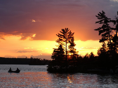 Couple In Boat, Lake Scenes by Keith Levit Pricing Limited Edition Print image