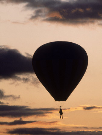 Silhouetted Hot Air Balloon At Sunset by Peter L. Chapman Pricing Limited Edition Print image