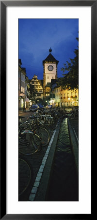 Bicycles Parked Along A Stream Near A Road, Freiburg, Baden-Wurttemberg, Germany by Panoramic Images Pricing Limited Edition Print image