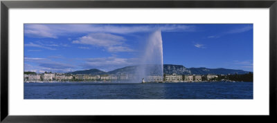Fountain In Front Of Buildings, Jet D'eau, Geneva, Switzerland by Panoramic Images Pricing Limited Edition Print image