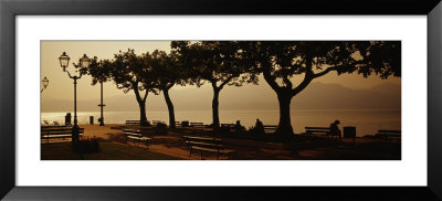 Benches In A Park, Torri Del Benaco, Lake Garda, Italy by Panoramic Images Pricing Limited Edition Print image