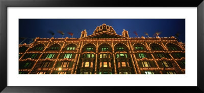 Building Lit Up At Night, Harrods, London, England by Panoramic Images Pricing Limited Edition Print image