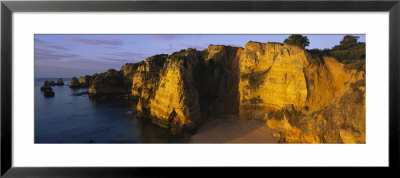 Rock Formations On The Beach, Lagos, Algarve, Portugal by Panoramic Images Pricing Limited Edition Print image