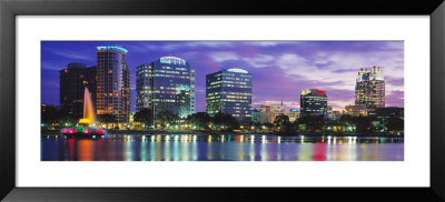 Panoramic View Of An Urban Skyline At Night, Orlando, Florida, Usa by Panoramic Images Pricing Limited Edition Print image
