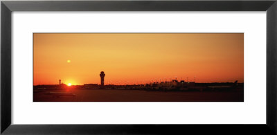 Sunset Over An Airport, O'hare International Airport, Chicago, Illinois, Usa by Panoramic Images Pricing Limited Edition Print image
