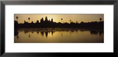 Silhouette Of A Temple At Sunrise, Angkor Wat, Cambodia by Panoramic Images Pricing Limited Edition Print image