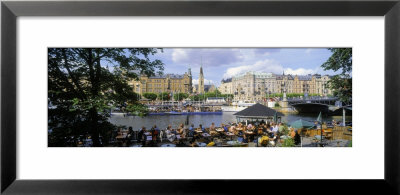 Tourist Sitting In A Restaurant, Djurgarden, Stockholm, Sweden by Panoramic Images Pricing Limited Edition Print image