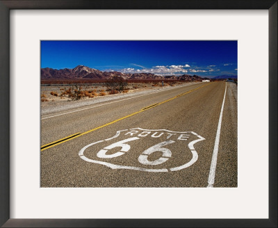 Route 66 Sign On Highway Near Amboy, Mojave Desert, California by Witold Skrypczak Pricing Limited Edition Print image