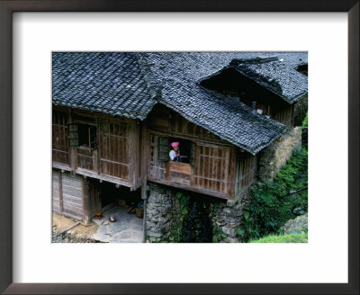 Zhuang Girl In Traditional Wood House, China by Keren Su Pricing Limited Edition Print image