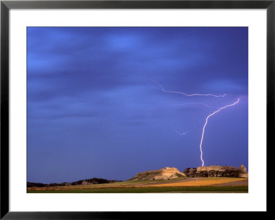 Lightning Strikes Buttes Near Scottsbluff, Nebraska, Usa by Chuck Haney Pricing Limited Edition Print image