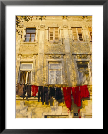 Washing Line Of Colourful Laundry In Old Town Buzet, Hilltop Village, Buzet, Istria, Croatia by Ken Gillham Pricing Limited Edition Print image