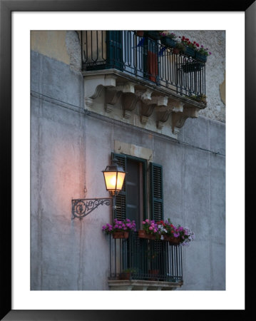 Streetlights On Via R. Settimo, Ortygia Island, Syracuse, Sicily, Italy by Walter Bibikow Pricing Limited Edition Print image