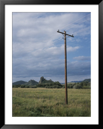 A Power Line Runs Through A Field by Taylor S. Kennedy Pricing Limited Edition Print image