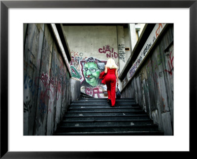 Woman Climbing Graffiti Stairwell, Belgrade, Serbia by Doug Mckinlay Pricing Limited Edition Print image
