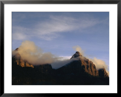 Clouds Wreath The Top Of Rock Formations In Zion by Stephen Alvarez Pricing Limited Edition Print image